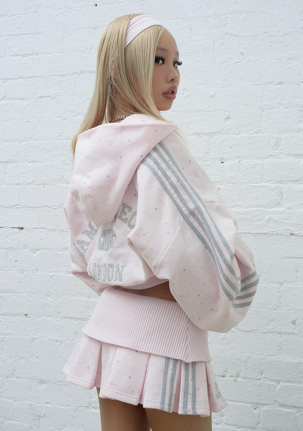 MALFUNCTION SPORTY PLEATED MINI SKIRT BABY PINK