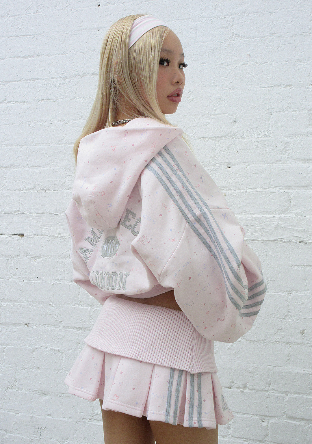 MALFUNCTION SPORTY PLEATED MINI SKIRT BABY PINK